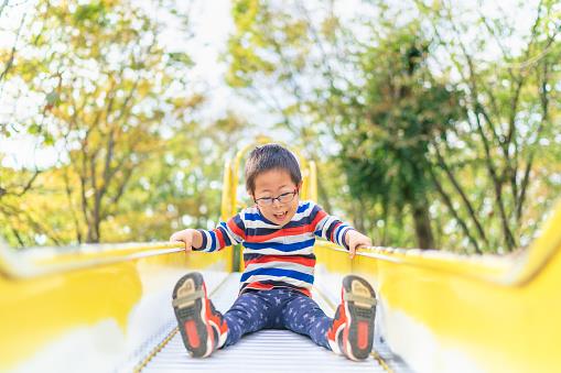 kid on slide 